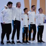 Cloud9 celebrate a win on Day One of Worlds