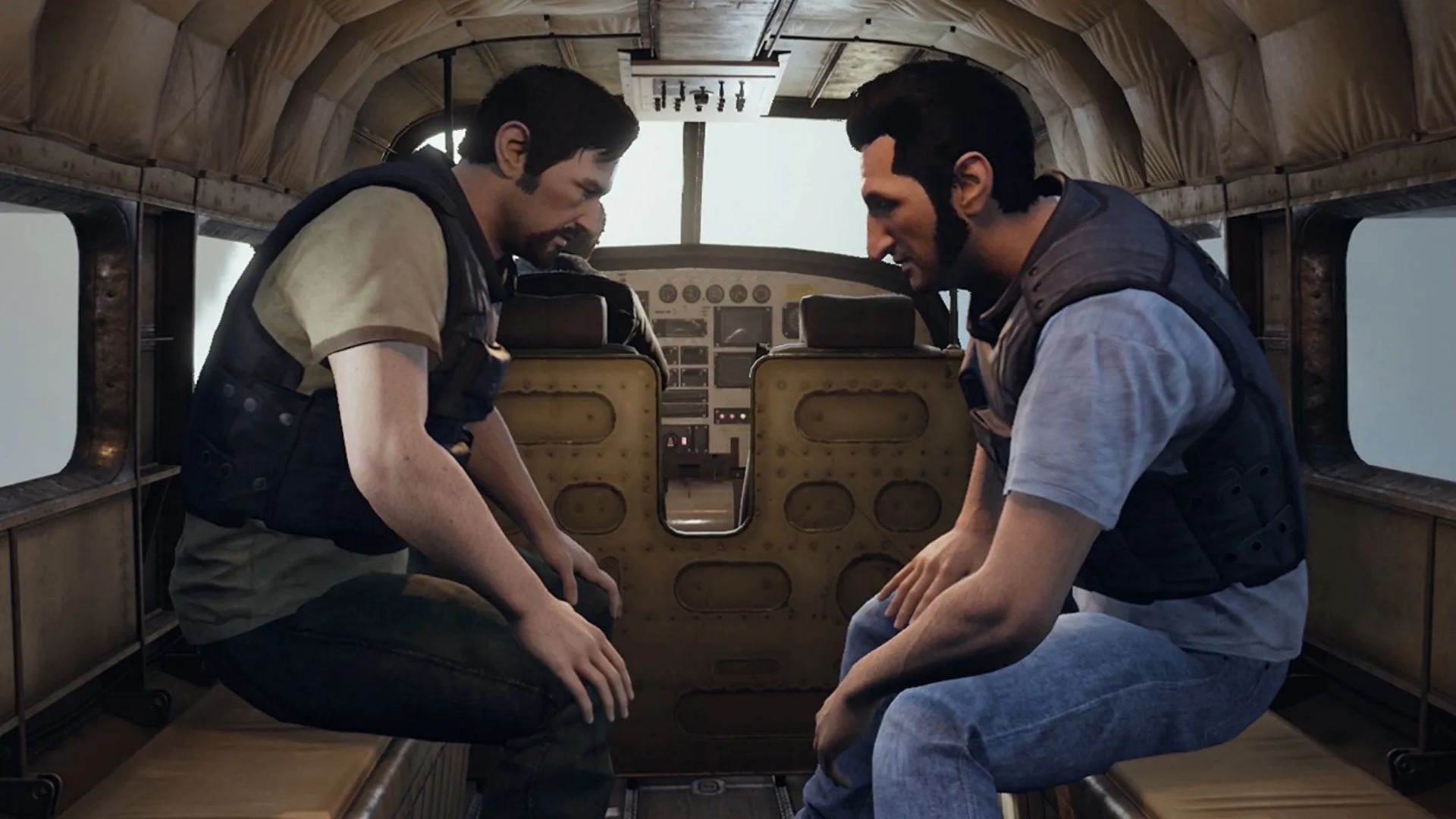 Leo e Vincent seduti su un aereo in una via d'uscita